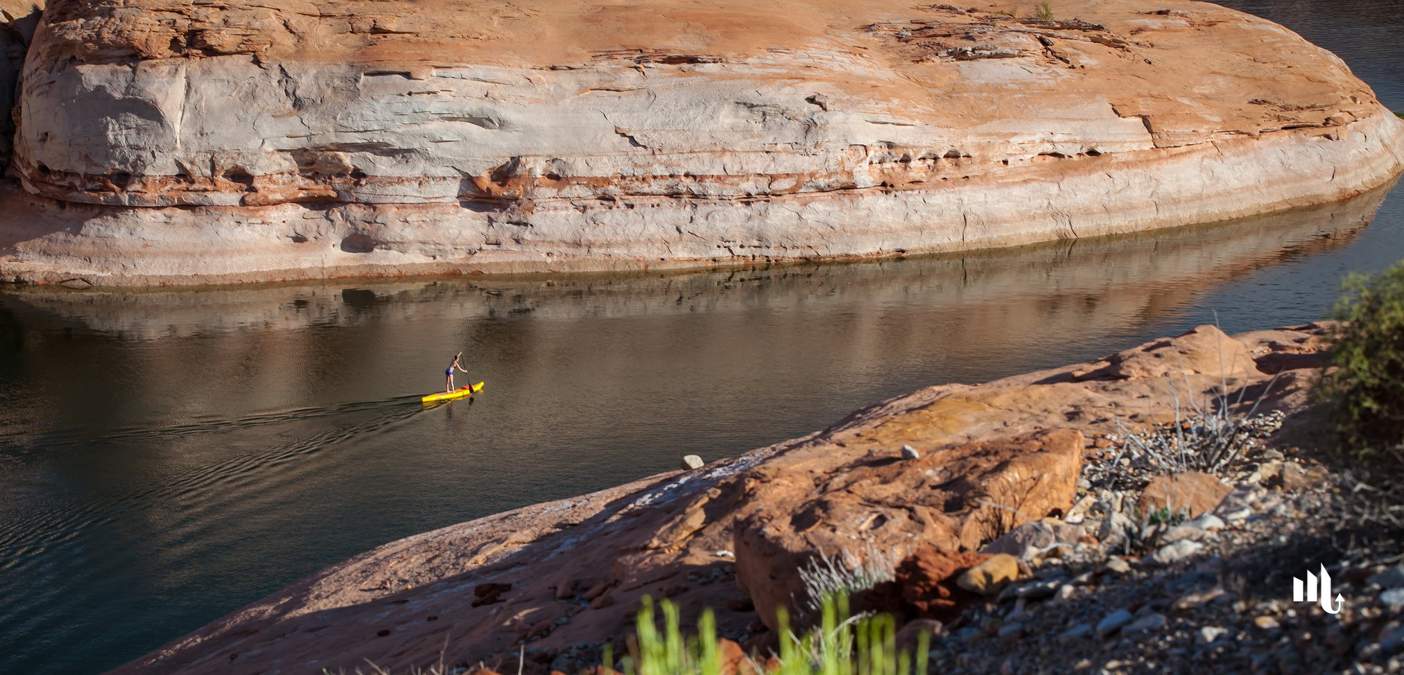 inflatable paddle board on calm water