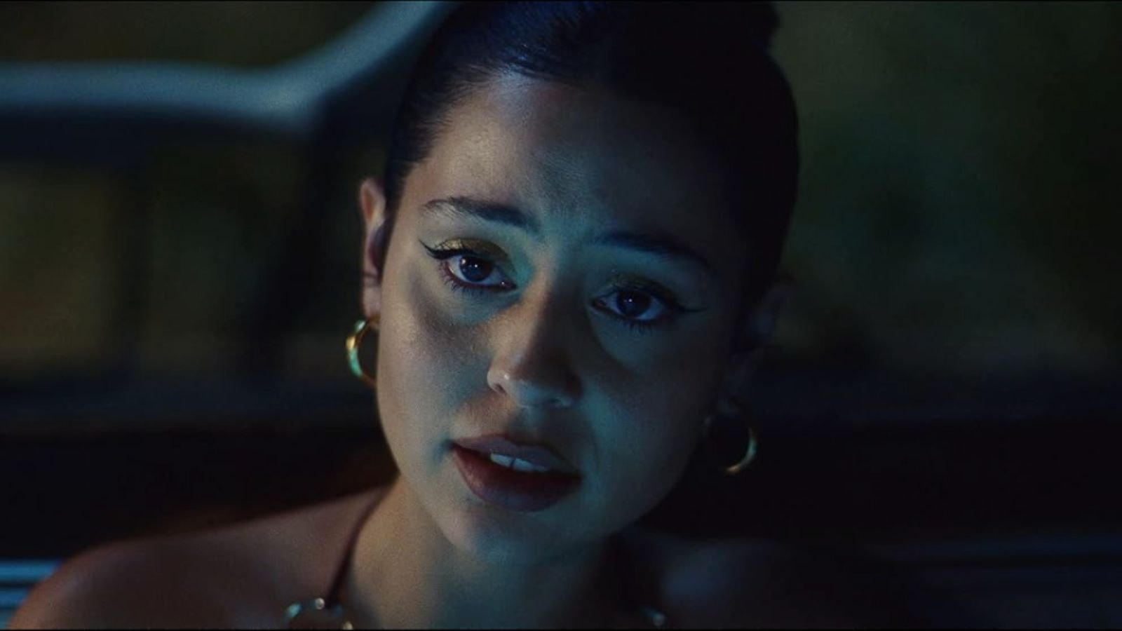 Closeup of Alexa Demie as Maddy tearful in blue light in Euphoria Season 2