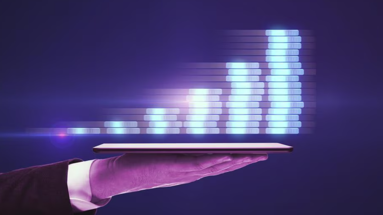 Tablet held under glowing digital bars, symbolizing the growth possible when you switch to VoIP.