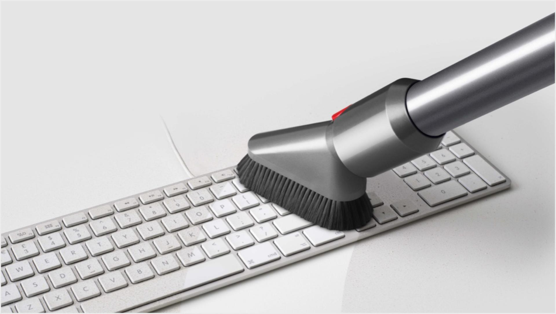 Keep your computer's keyboard clean with a nozzle dust vacuum or vacuum with a brush extension