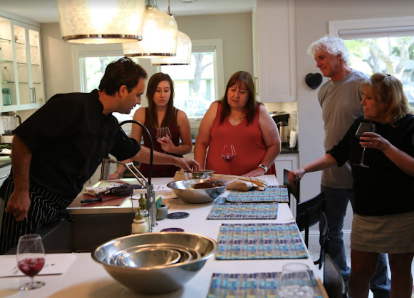 An image of Chef Carlos Crusco conducting a private cooking class in Austin, showcasing his expertise in Argentine and European cuisine." with the keyword private chef cooking class ideas austin included.