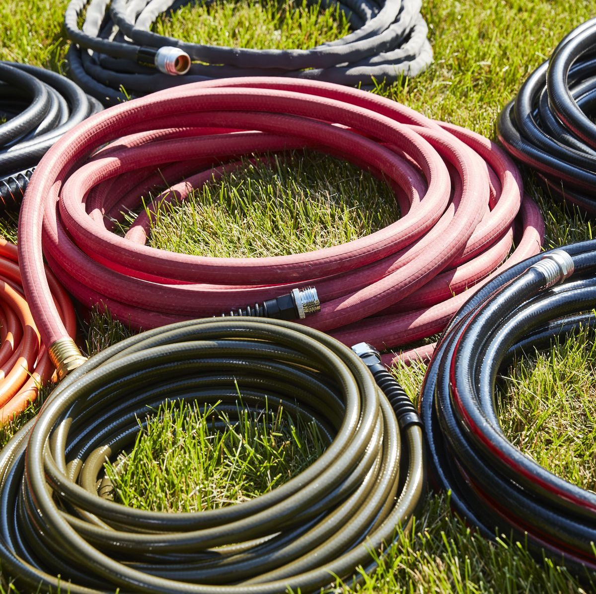 Various types of rubber hoses in a warehouse