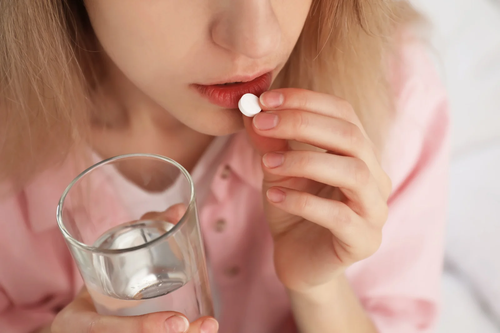 Woman self medicating for anxiety symptoms