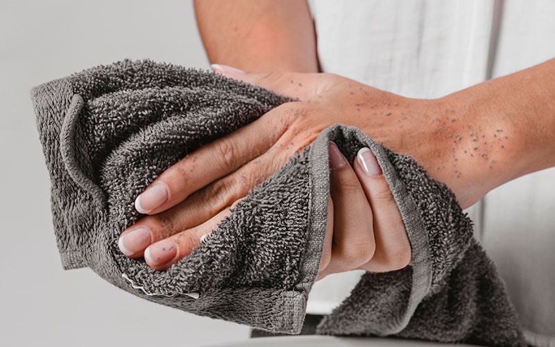 Grey towel shedding fibers on use