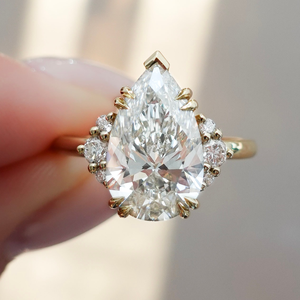 Signature Cluster with Pear Cut Diamond