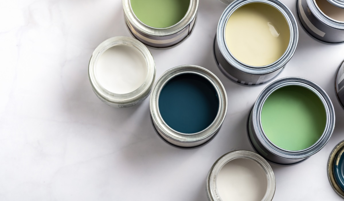 Kitchen Summer-Colours Makeover: Painting Your Kitchen Cabinets for Spring & Summer - tins of neutral shade paint - from above - blue, green. white and cream