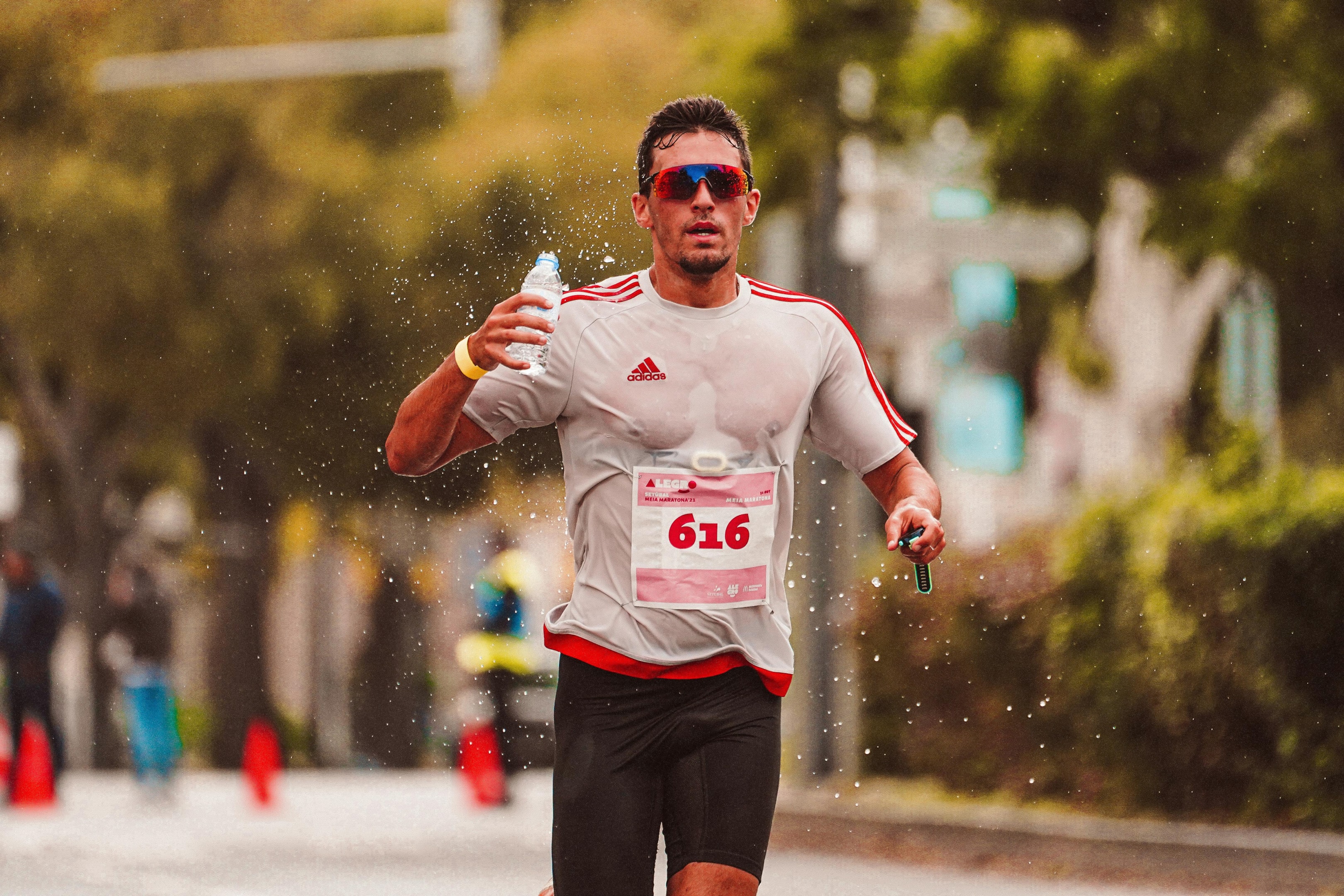 For women, a good quality sports bra is definitely a game-changer. Layering it up with moisture-wicking clothes in case of cold weather is what most runners do. Photo by RUN 4 FFWPU: https://www.pexels.com/photo/man-in-white-and-red-shirt-running-10226374/