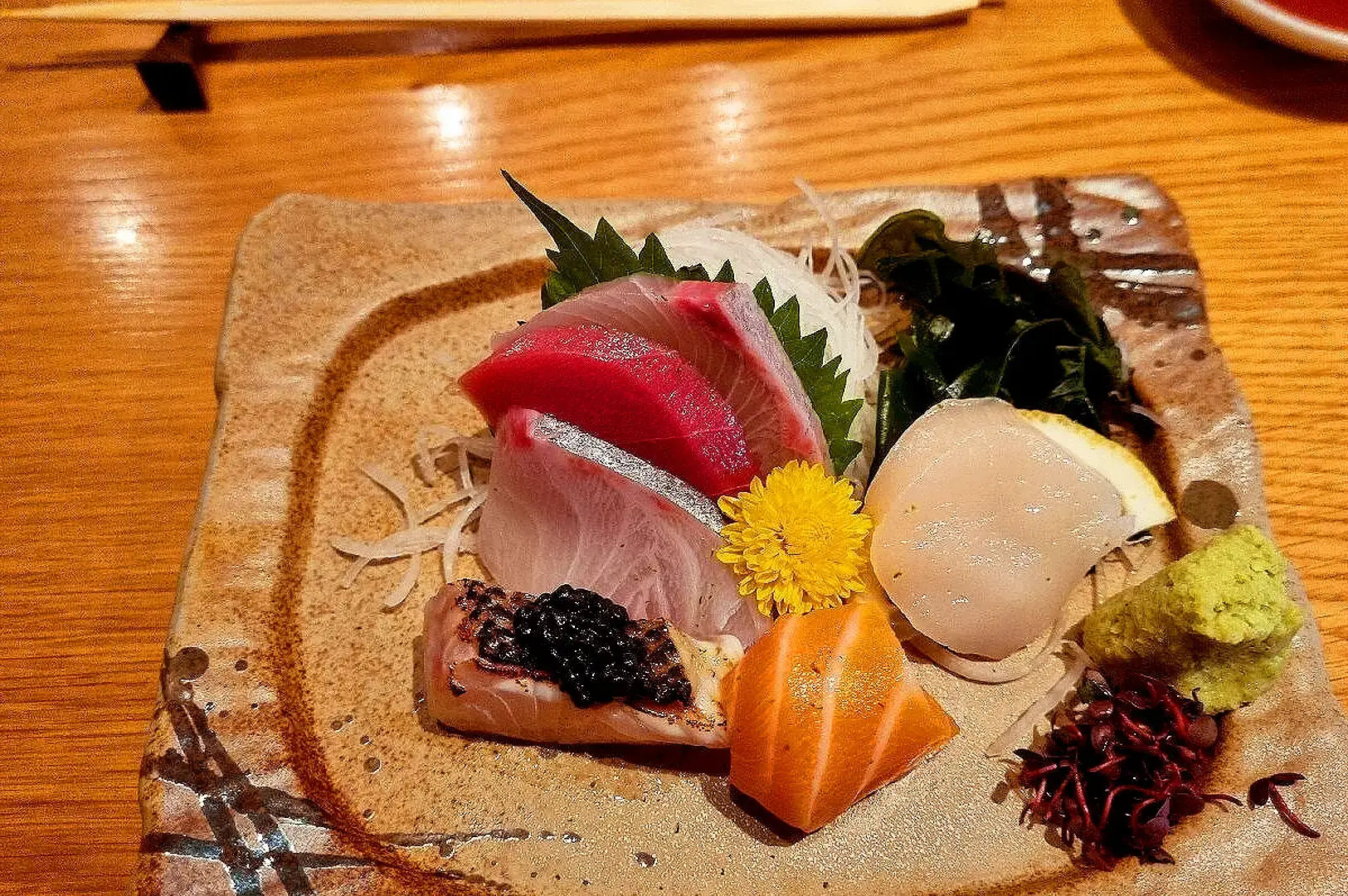 Sushi Jin Singapore fresh sashimi platter featuring tuna, salmon, squid and seasonal seafood