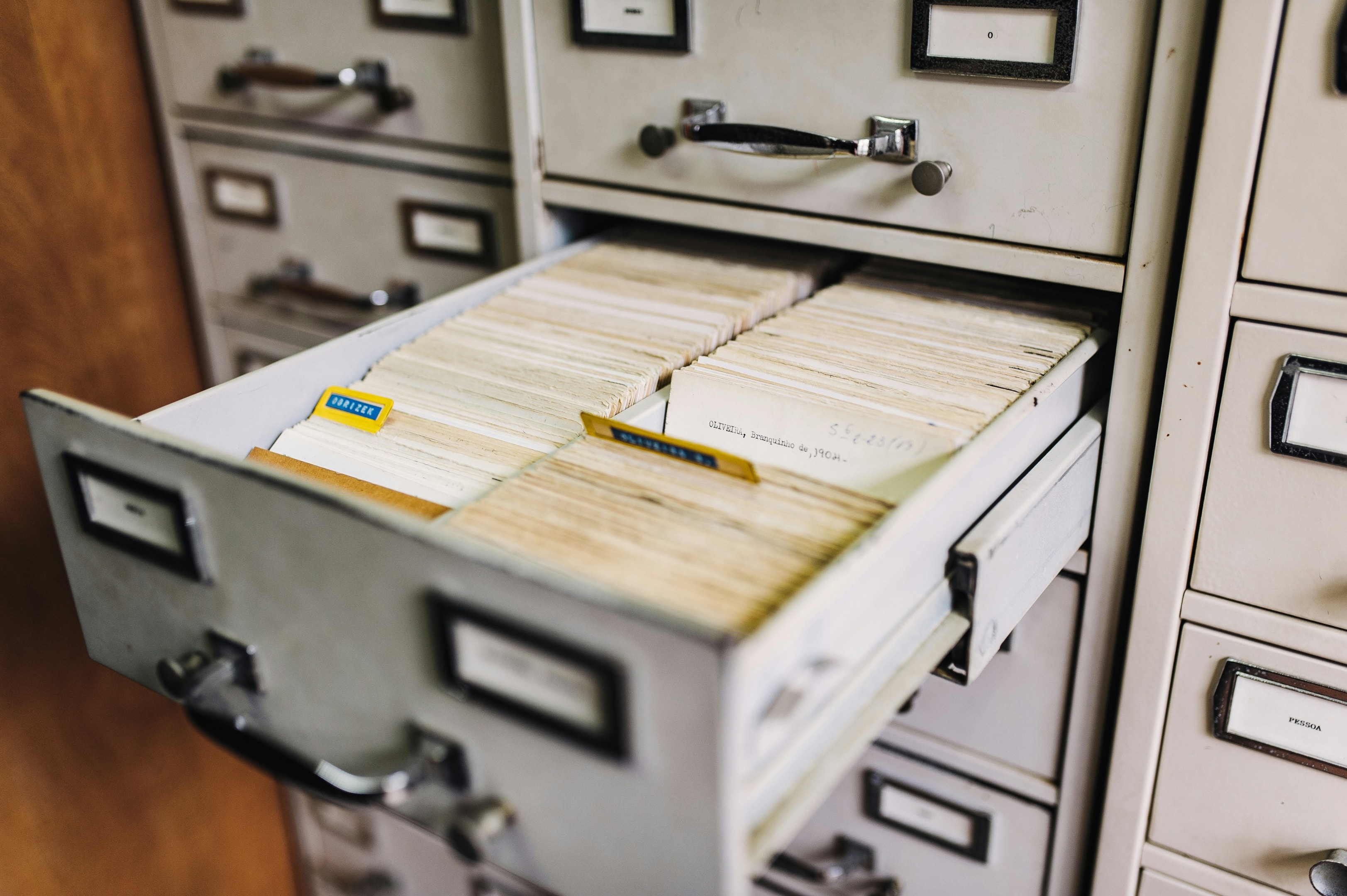 Public records at courthouse to be manually searched by real estate investor.