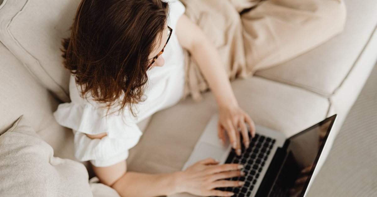 Woman confirming refund status online after learning what happens if you overpay taxes.