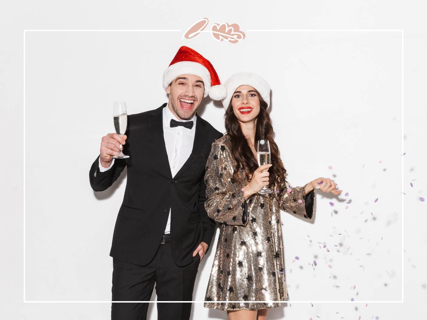 Couple celebrating with champagne in Santa hats, embracing holiday spirit with festive joy and Christmas gifts for loved ones and friends.