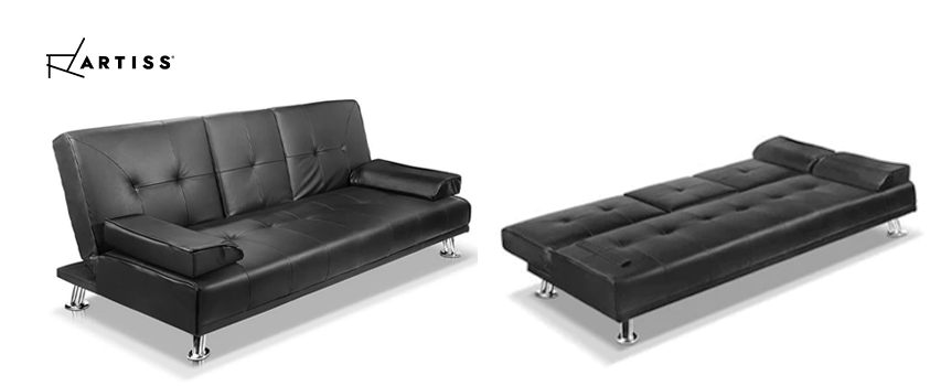 An Artiss black PU leather two seater sofa bed. 