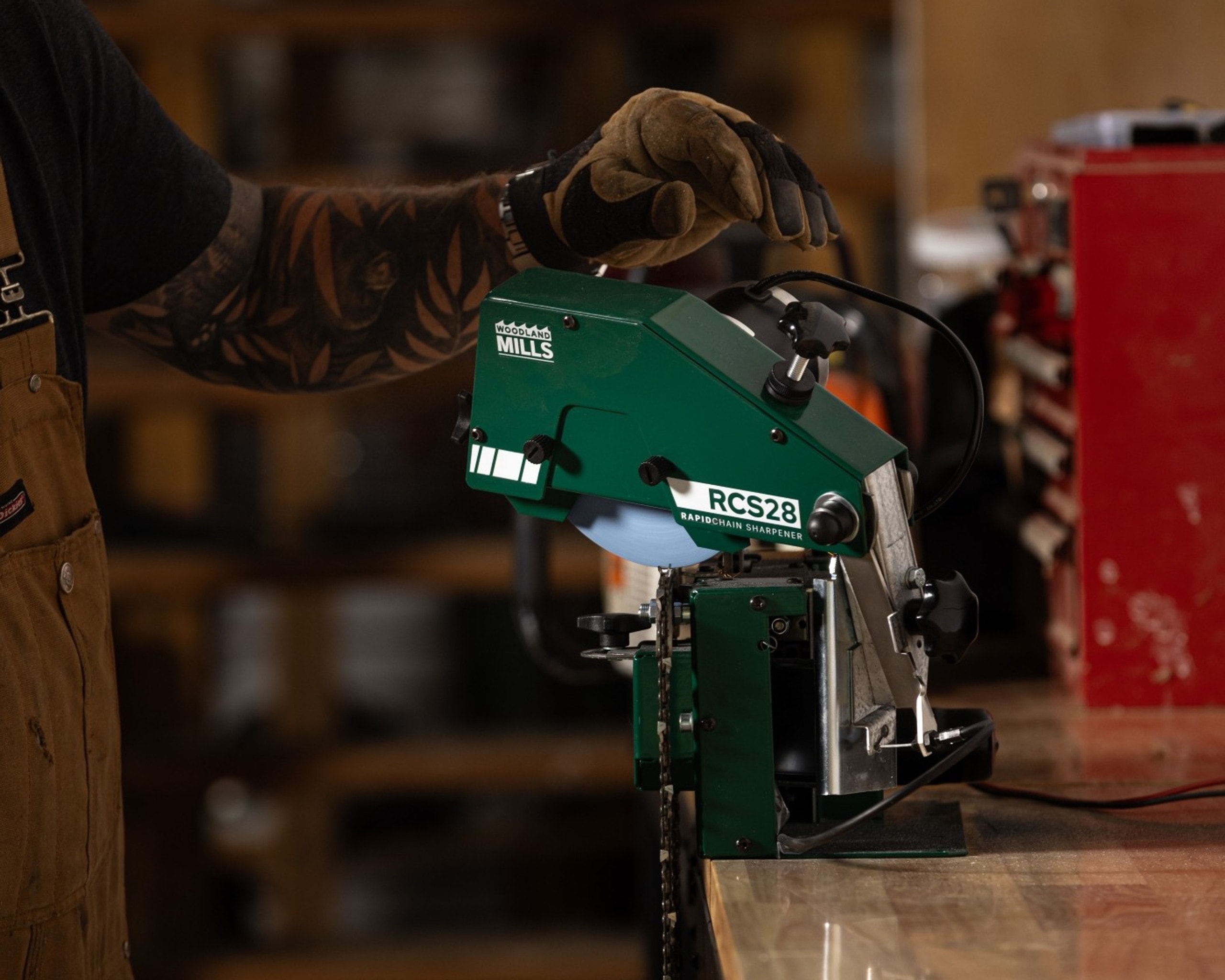 A Woodland Mills RCS28 Chainsaw Sharpener. Electric sharpeners like this use a 12V battery. 