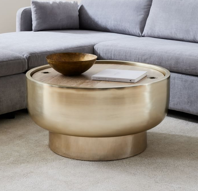 gold coffee table with extra storage space inside