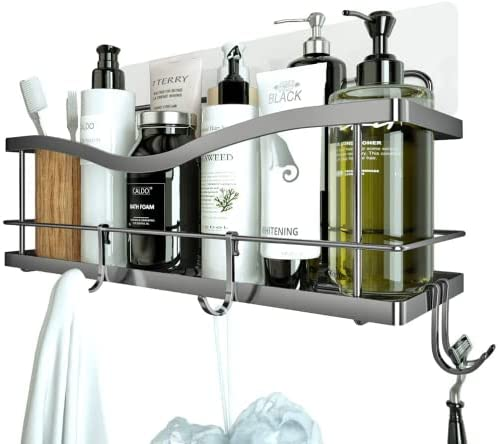 two white shower shelves with hooks