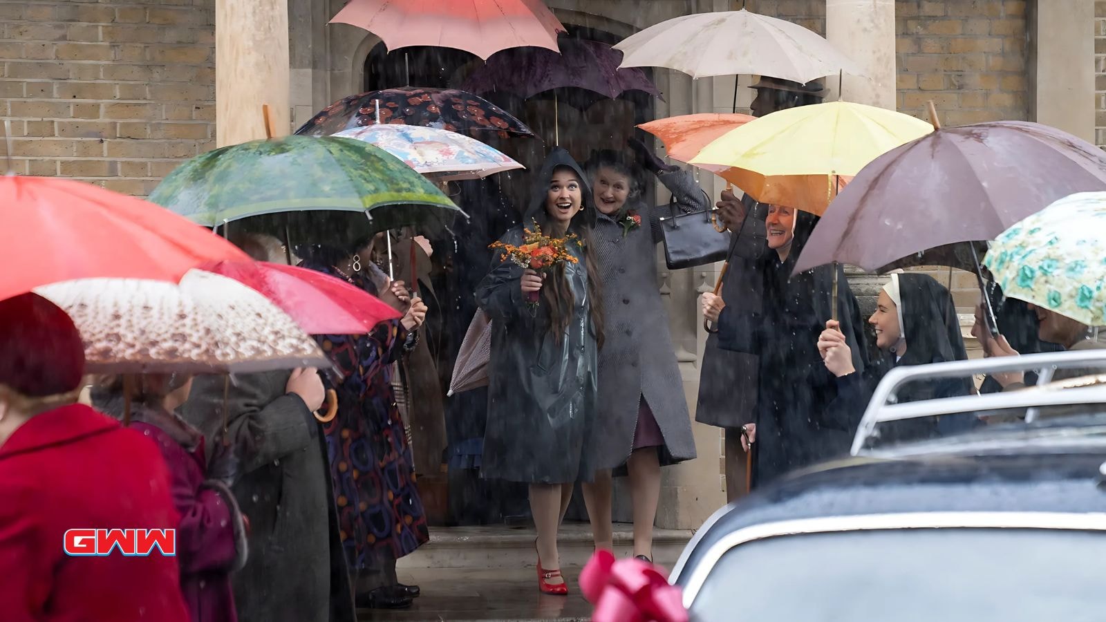 Megan Cusack as Nancy Corrigan in Call the Midwife walking down church steps.