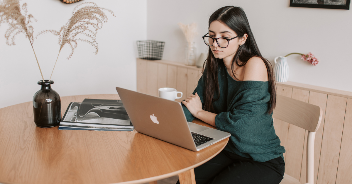 Woman studying finances to learn how to find a good accountant for OnlyFans.