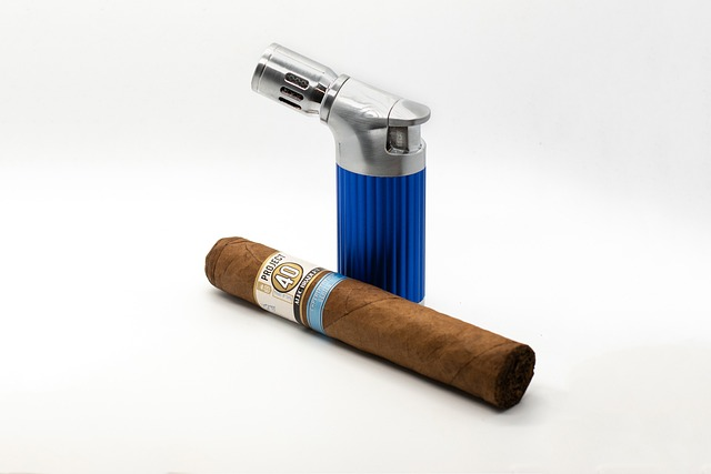 A cigar lighter with a blue flame, perfect for choosing the right fuel for your cigar.