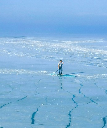 paddle board on a ice