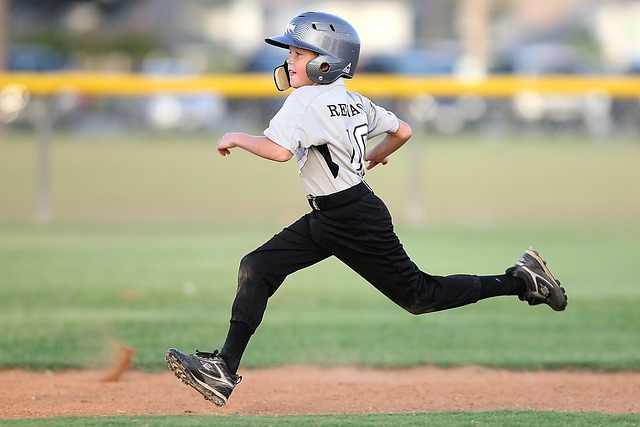 Youth Baseball Player running the bases.