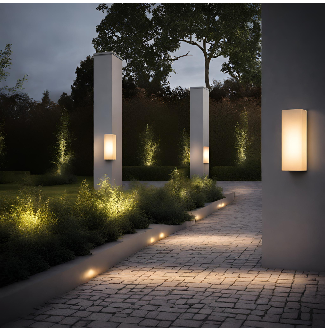 Outdoor Exterior wall lights placed along a pillar in an garden casting a soft ambient glow.