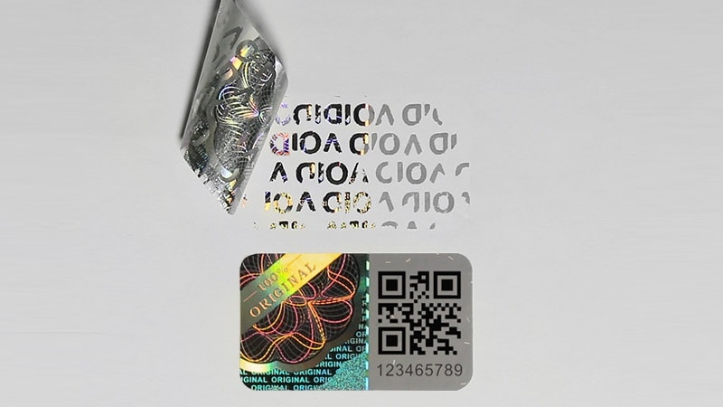 Void label with holographic effect