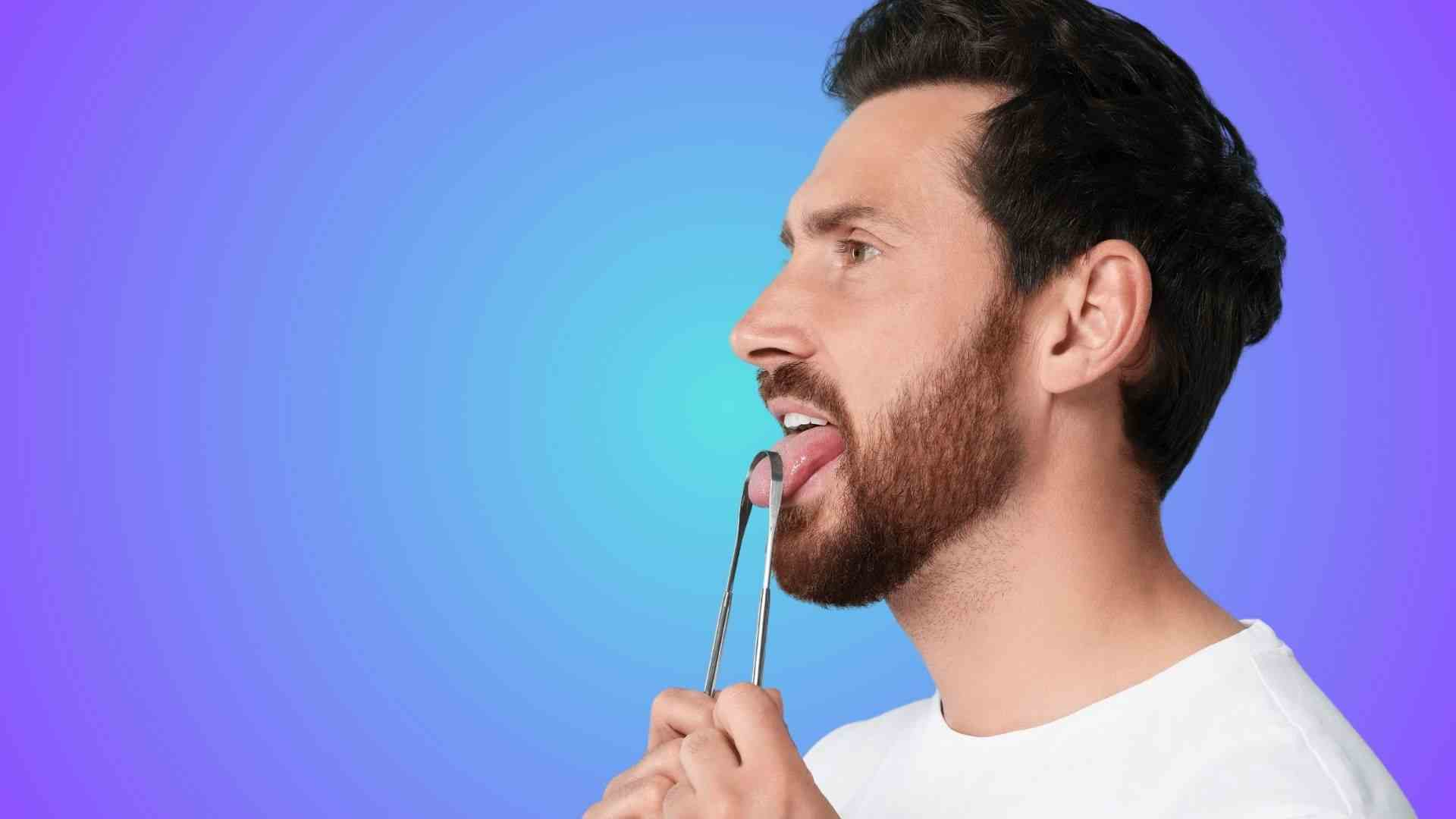 A man using tongue scraper