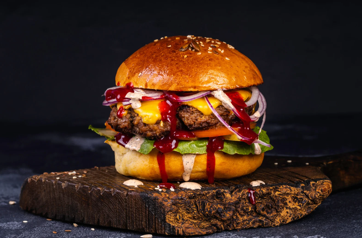 Burger dripping with sauce