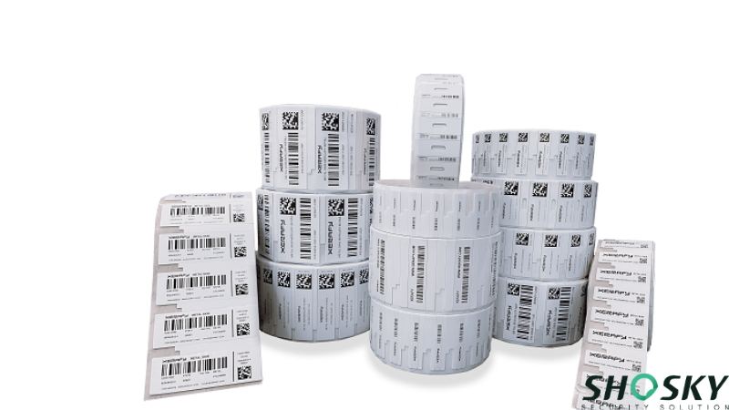 Multiple rolls and strips of white security labels