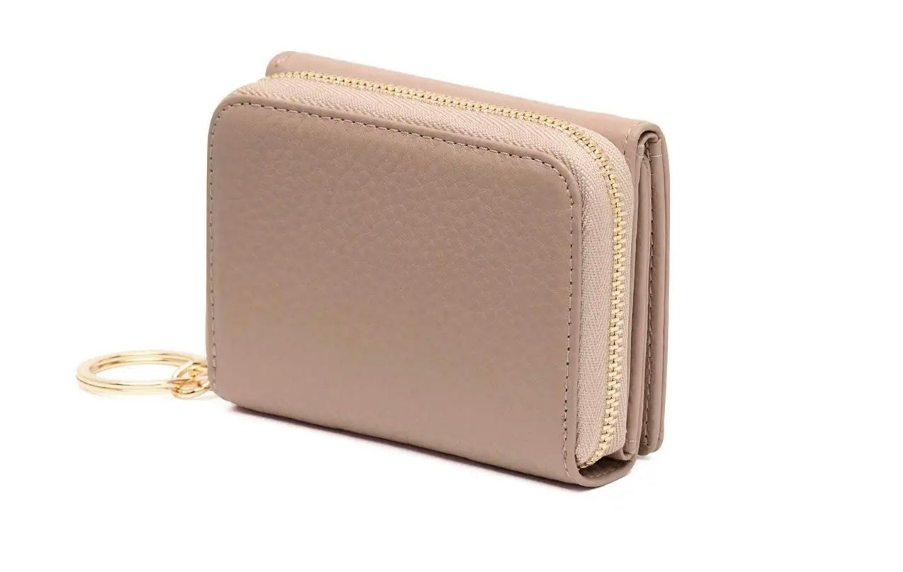 https://www.thephoenixdc.com/products/oad-studio-mini-zip-around-wallet-creme?_pos=1&_sid=382773840&_ss=r