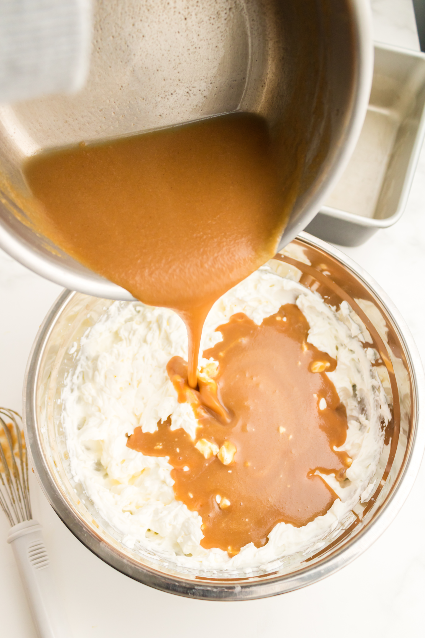peanut butter mixture poured into whipped cream