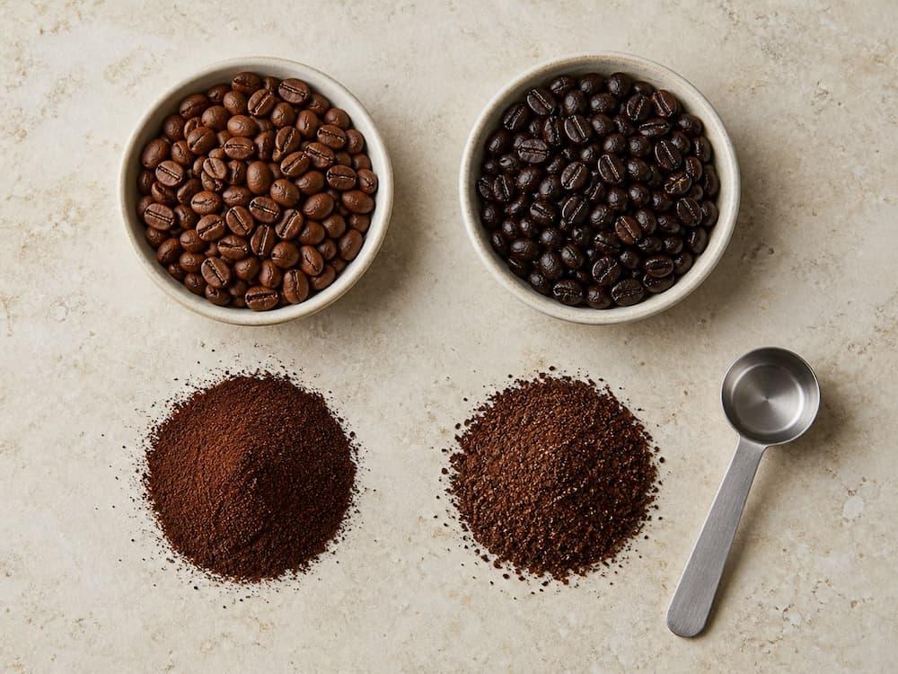 Medium and dark roasted coffee beans with fine and medium coffee grounds