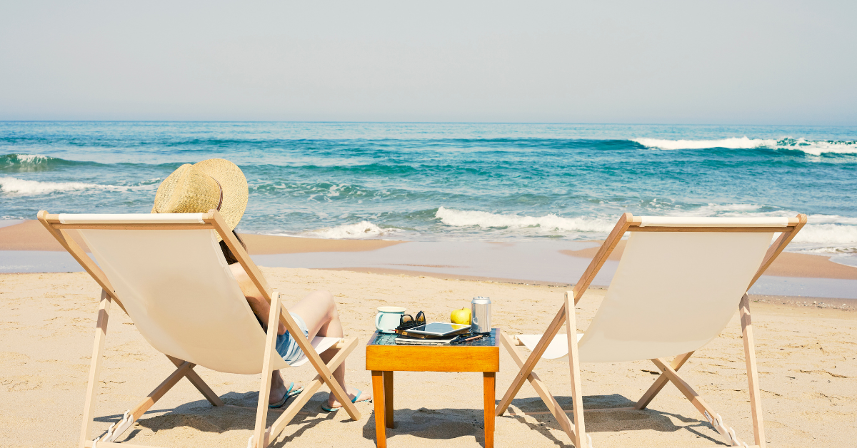 Relaxing beachfront scene in Brick, NJ with two lounge chairs facing the Atlantic Ocean — perfect for a peaceful Jersey Shore vacation rental getaway.
