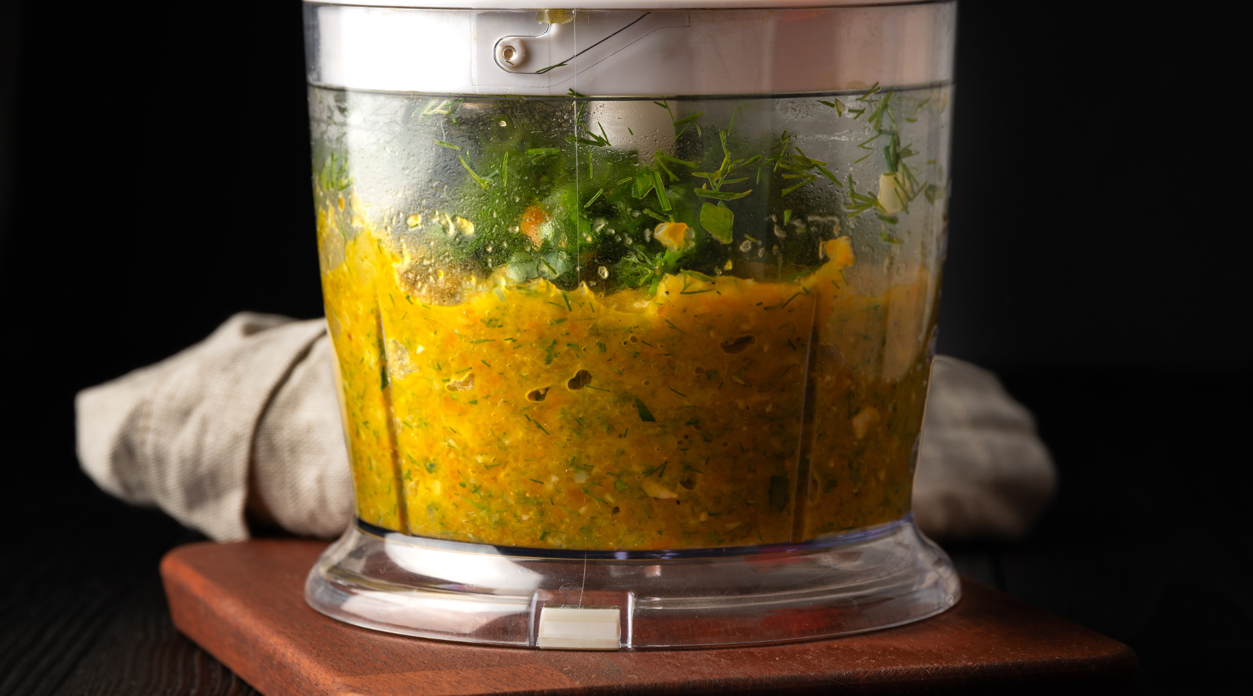Chicken puree with vegetables in a blender for baby food