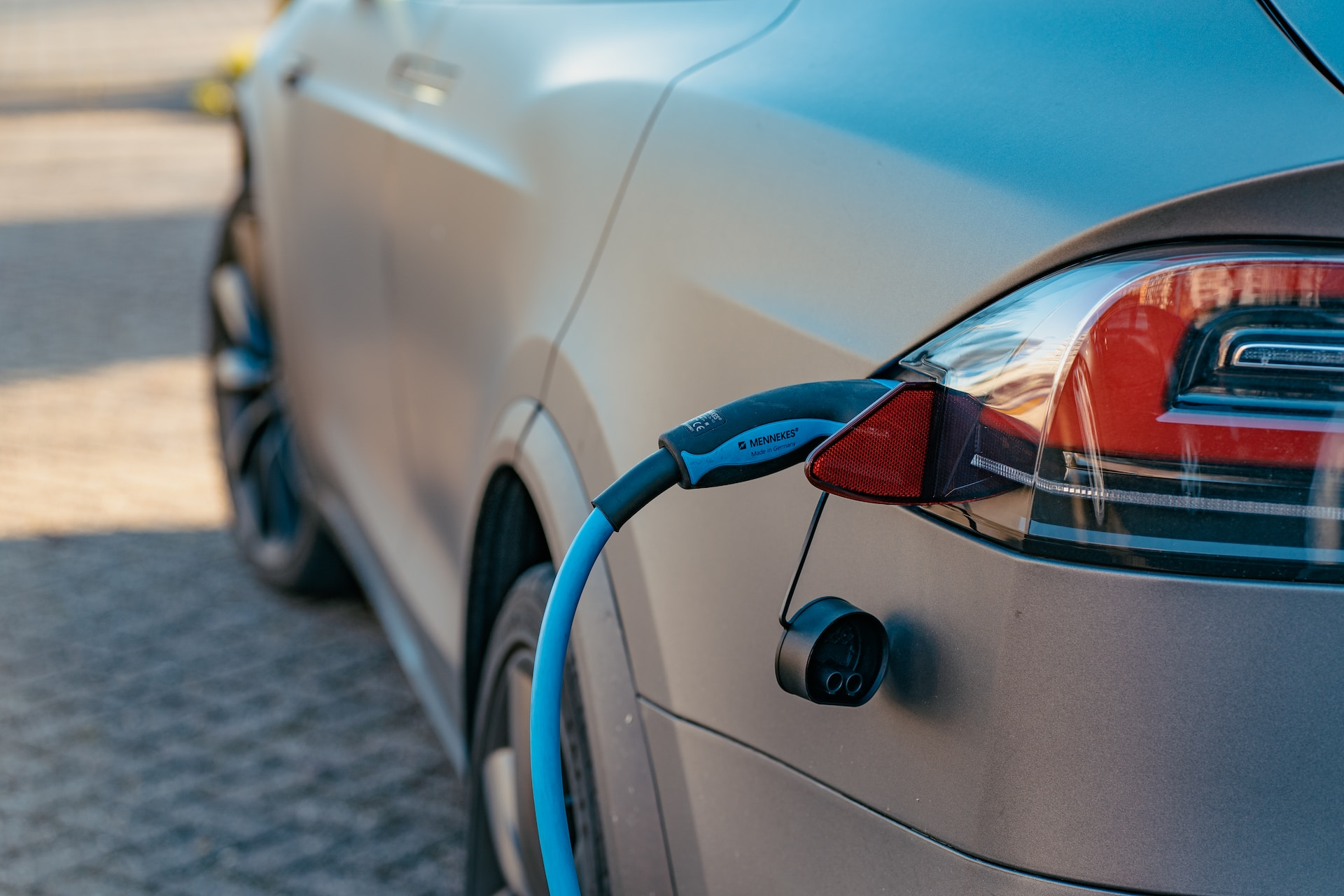 A charging cable plugged into a direct current fast charger