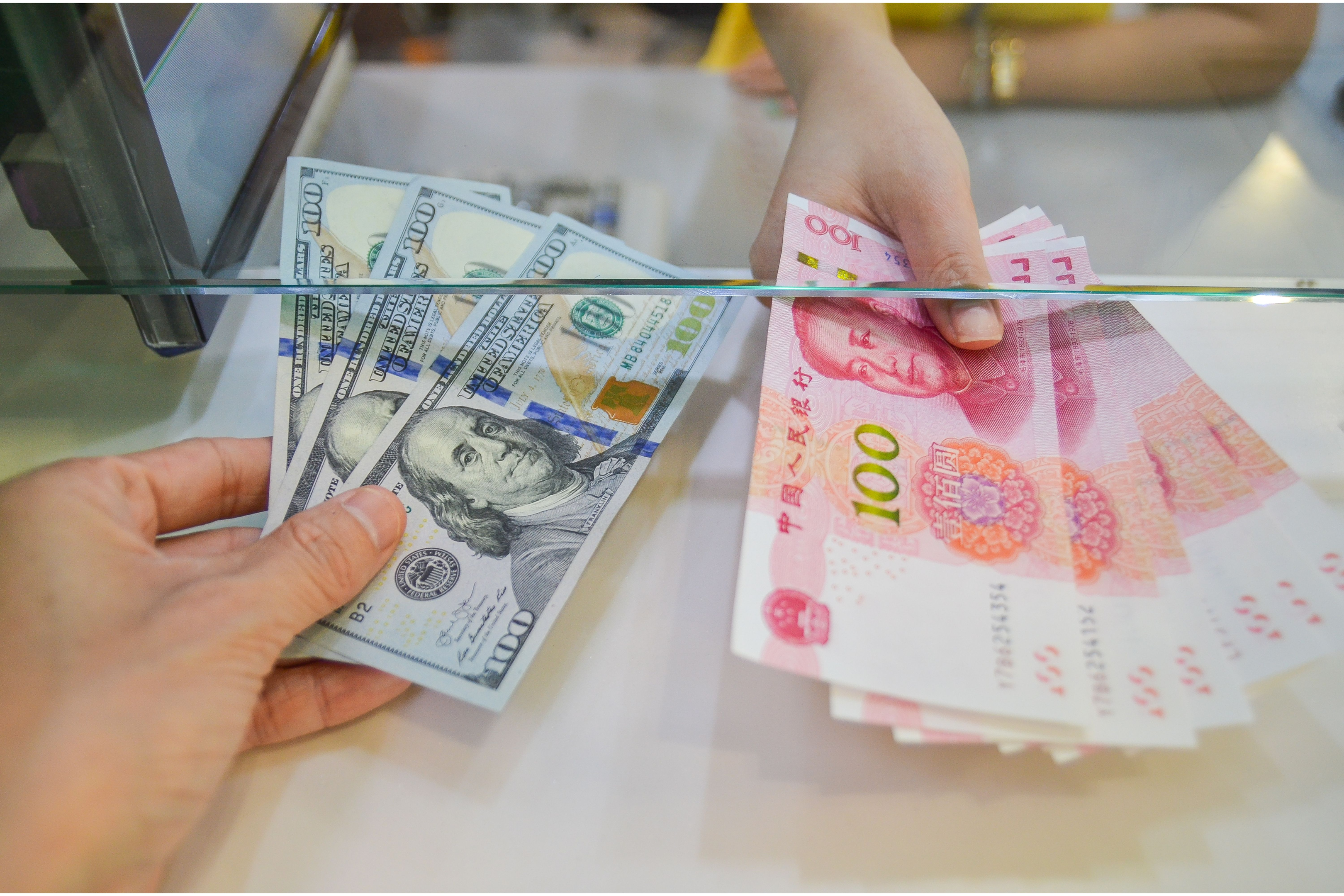 Money exchange. Exchanging dollars against chinese currency