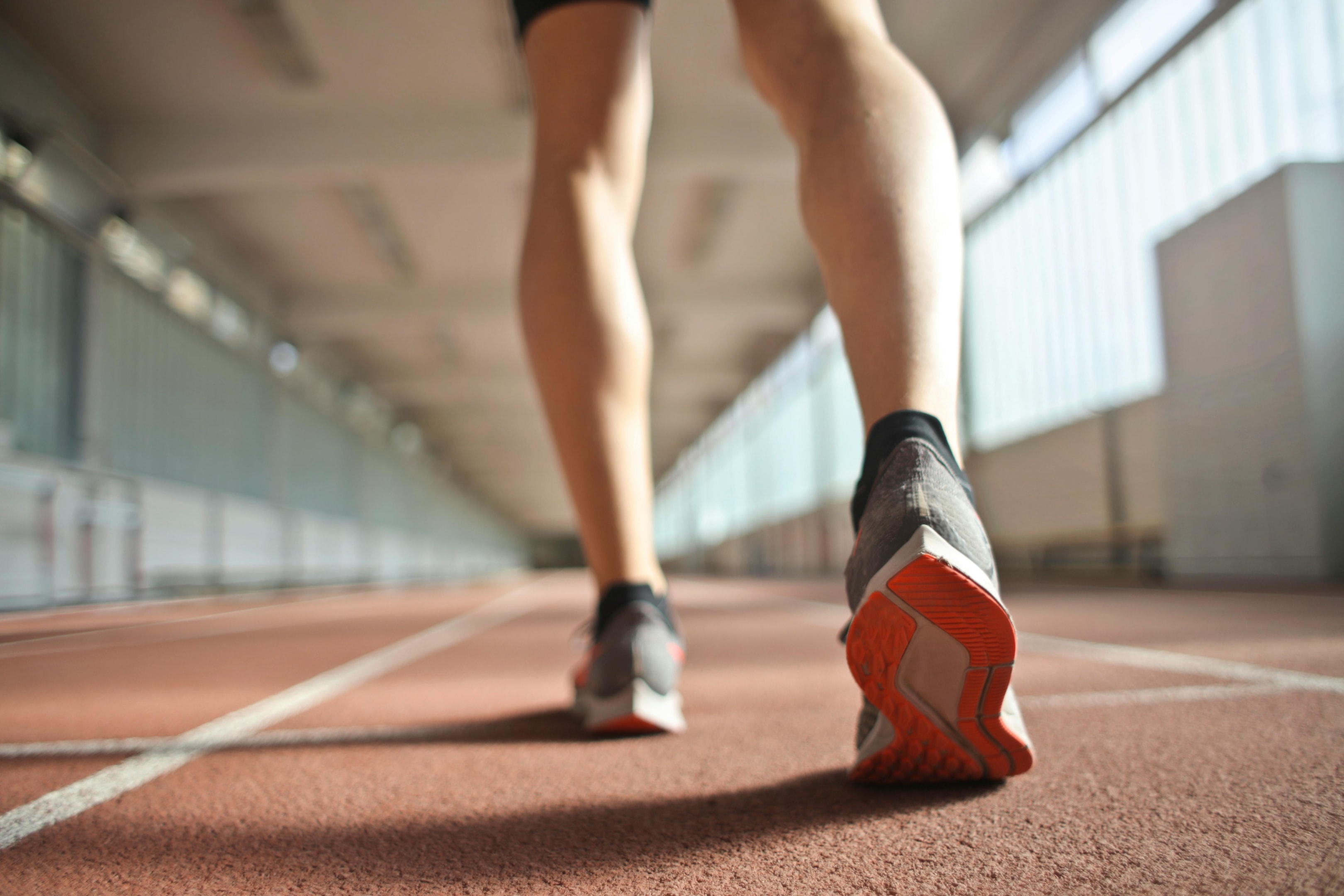 Photo by Andrea Piacquadio: https://www.pexels.com/photo/fit-runner-standing-on-racetrack-in-athletics-arena-3756165/