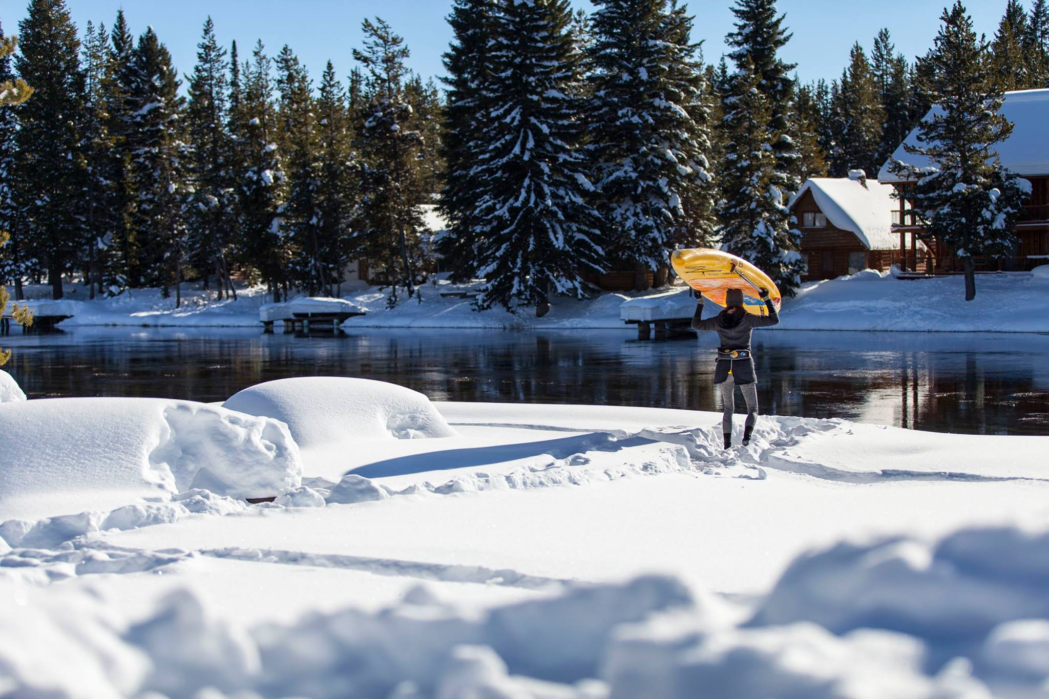 inflatable board carried through snow