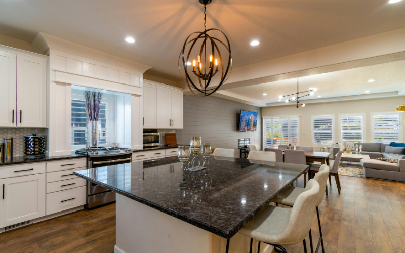 A unique designed pendant light hanging from kitchen 