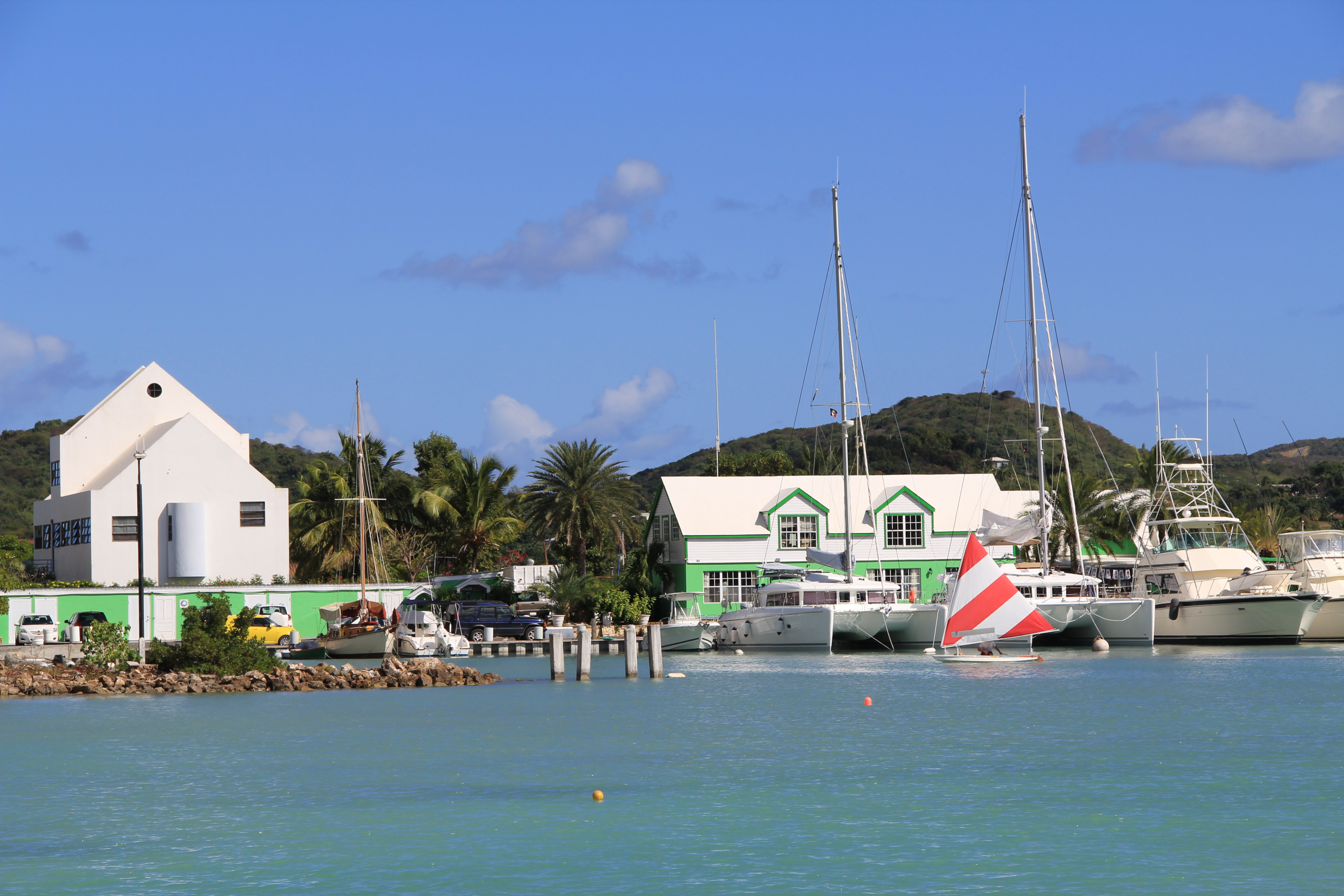 Sailboats docking for Antigua Sailing Week