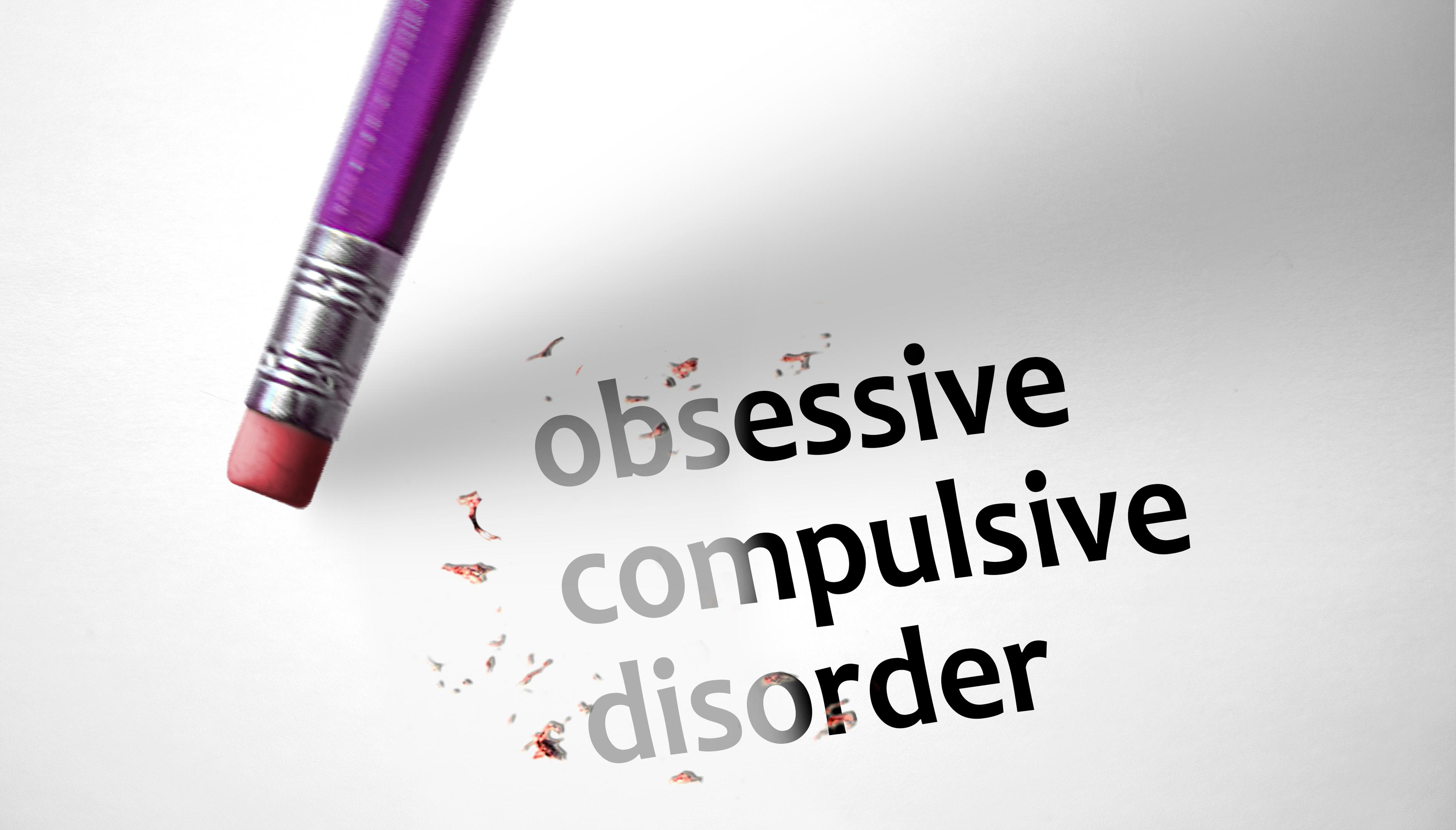 Pencil erases the words 'obsessive compulsive disorder' signifying that treatment is possible