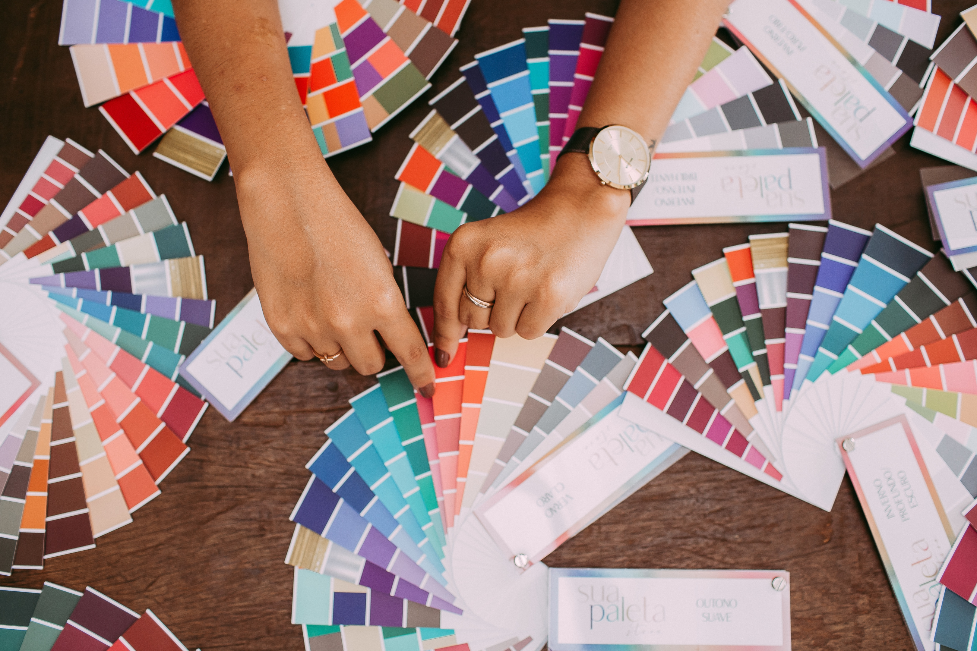 A graphic designer picking colors for her brand logo.