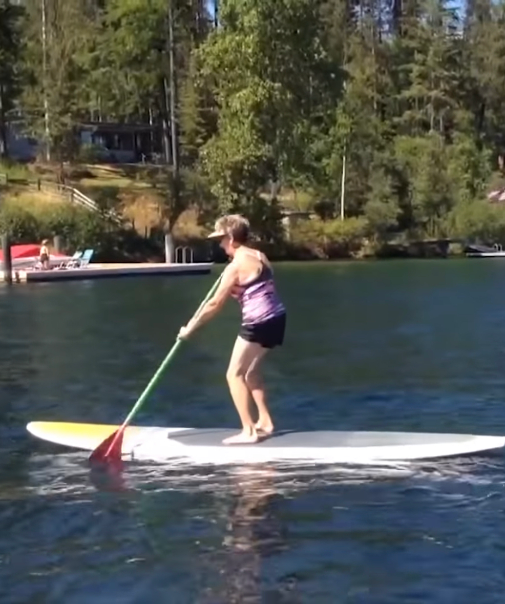 woman paddling a paddle board