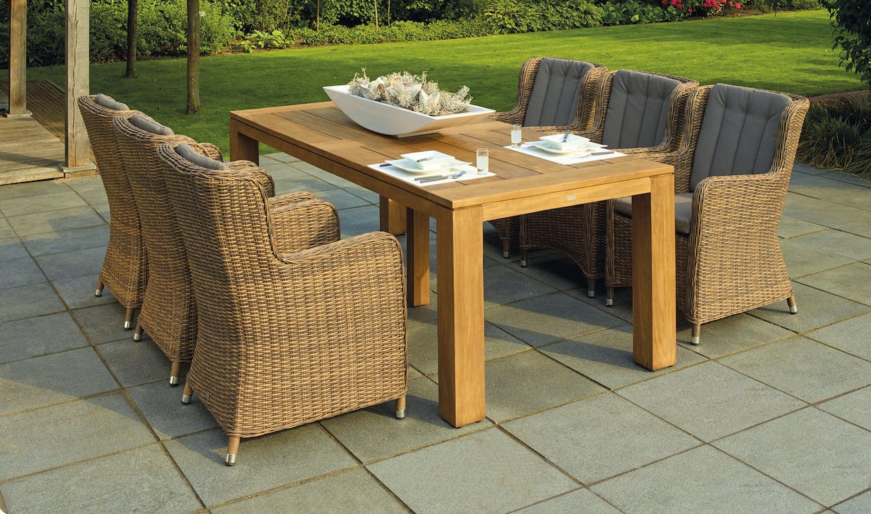 Pavers with dining table and comfortable seating