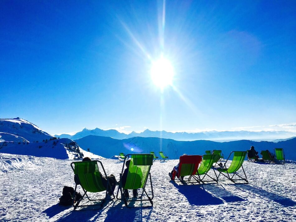 Enjoying the sun terrace at a late season ski resort