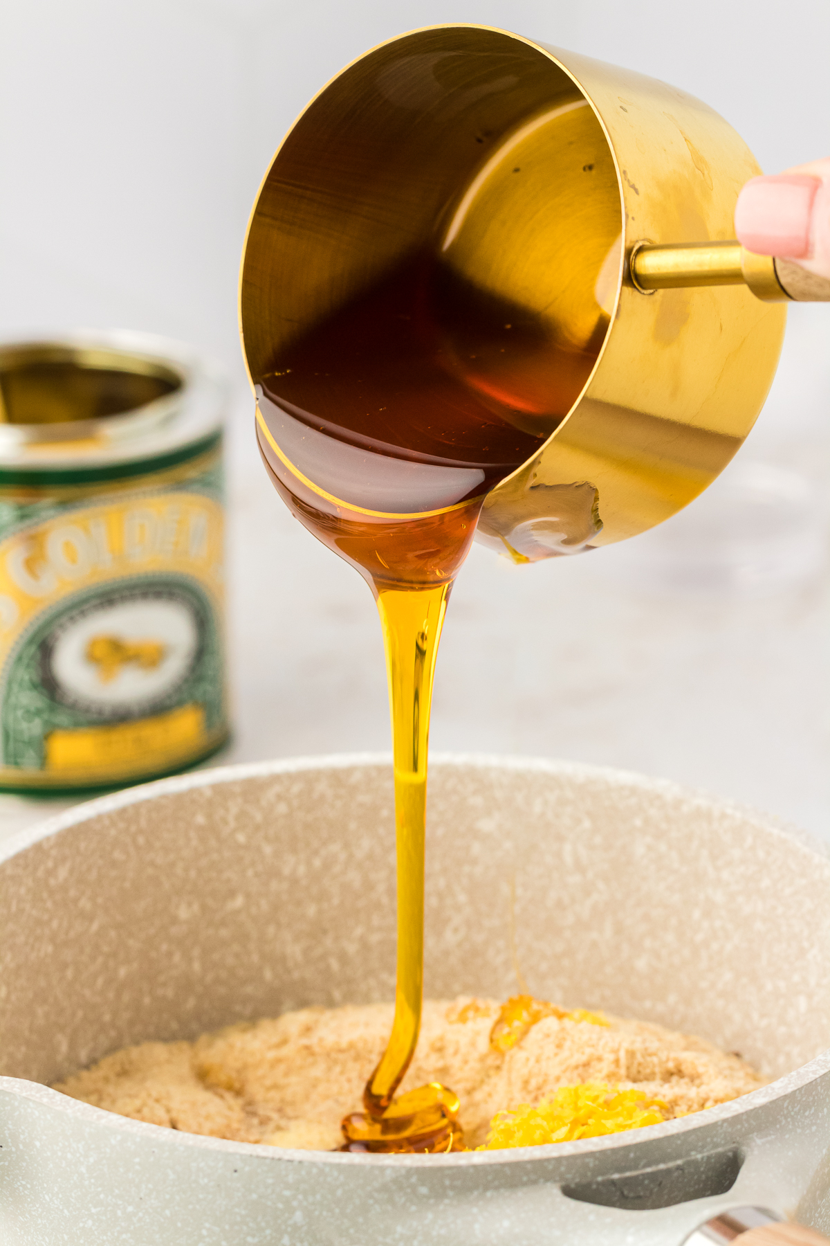golden syrup poured into saucepan