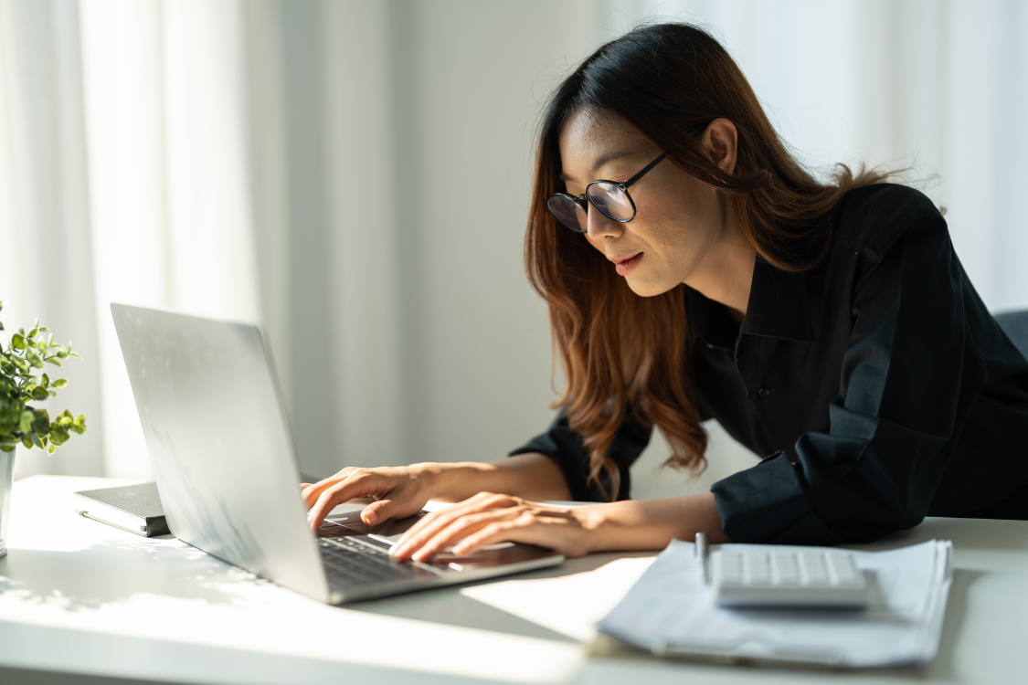 Job candidate submitting assessment task online during remote hiring process