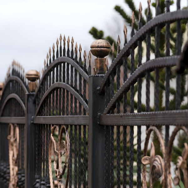 An image showing ornamental iron fencing.