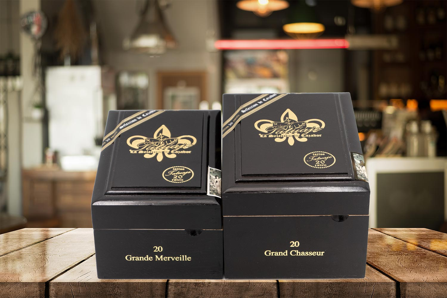 A box of Tatuaje 20th Grande Merveille and Grand Chasseur cigars