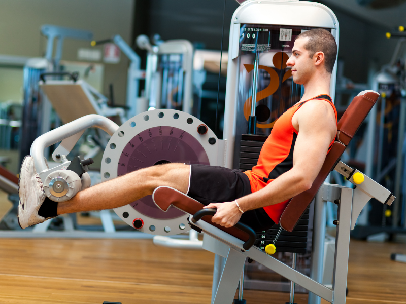 Image of a person performing leg curls.